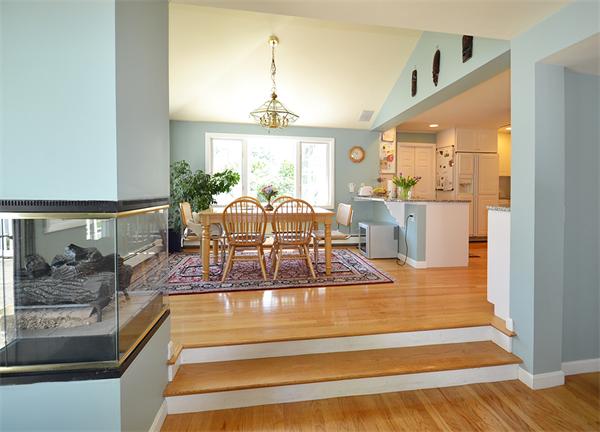 236 Parish Road Needham, MA 02494 - Photo 6 of 23 a view of a dining room with furniture a chandelier and wooden floor