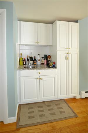 236 Parish Road Needham, MA 02494 - Photo 8 of 23 a view of a kitchen with sink and cabinets