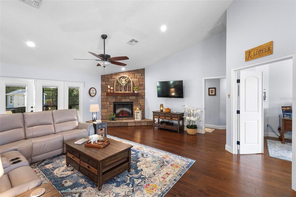 234 Geneva Heights Road Geneva, FL 32732 - Photo 11 of 57 Fireplace Elegance with the Touch of a Remote!