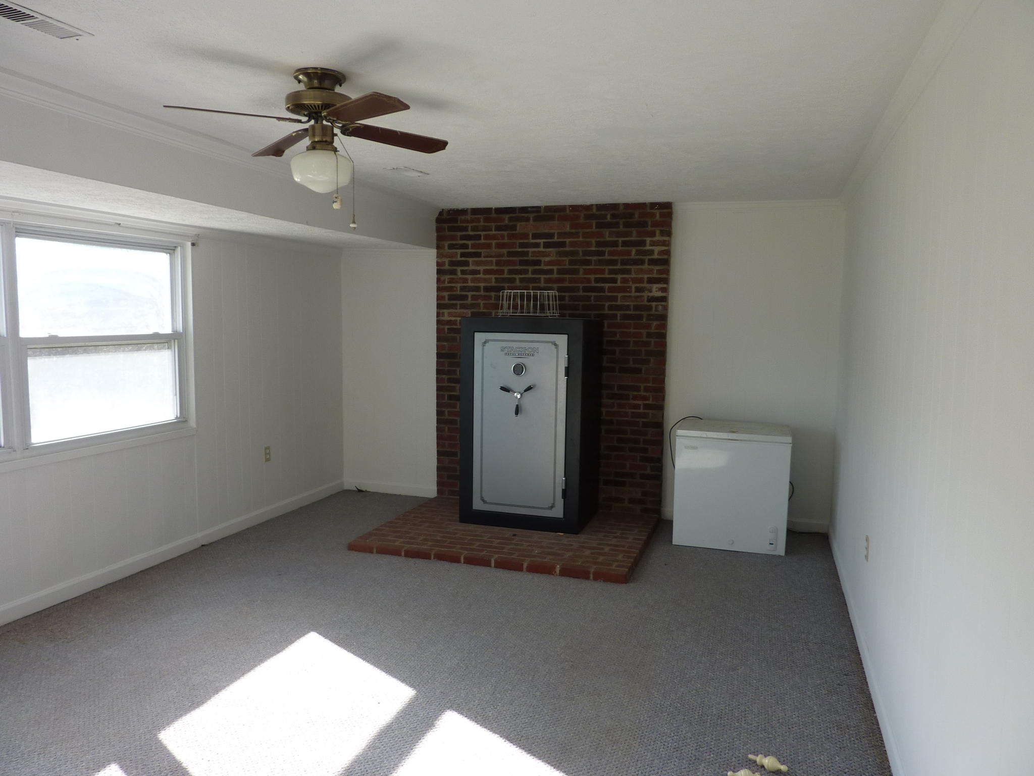 9700 Roanoke Road Elliston, VA 24087 - Photo 15 of 28 a view of a livingroom with a ceiling fan and window
