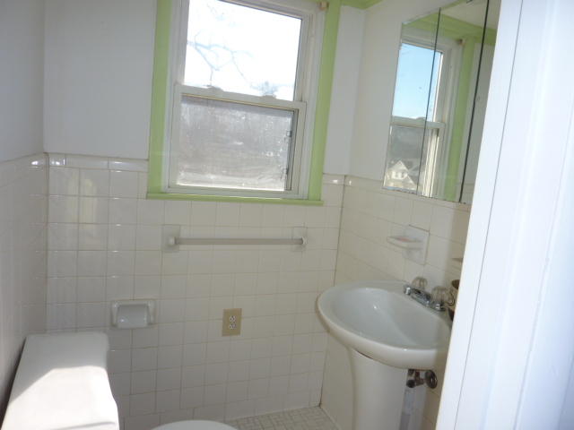 9700 Roanoke Road Elliston, VA 24087 - Photo 17 of 28 a bathroom with a sink and window