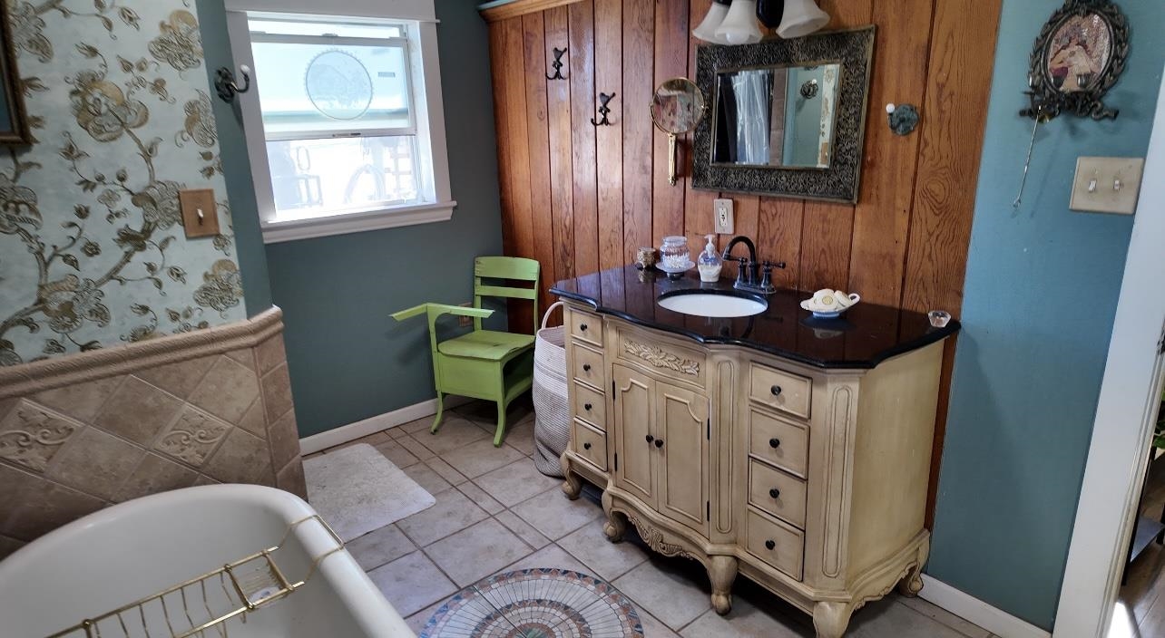 801 Mohawk Cherokee, TX 76832 - Photo 12 of 29 a bathroom with a sink and a mirror