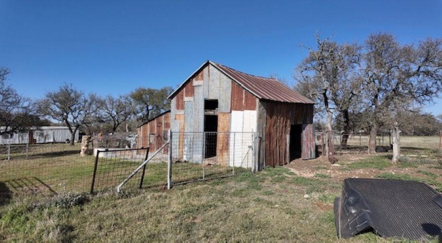 801 Mohawk Cherokee, TX 76832 - Photo 25 of 29 a house with trees in the background