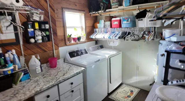 a utility room with dryer and washer