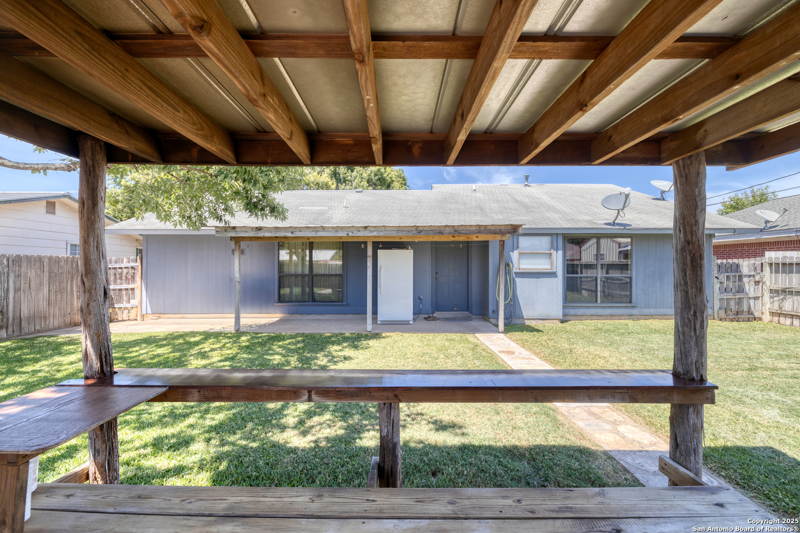 121 Rio Grande Street Uvalde, TX 78801 - Photo 17 of 29 a front view of house with a garden