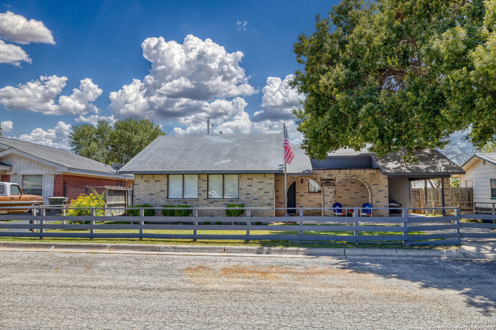 121 Rio Grande Street Uvalde, TX 78801 - Photo 2 of 29 a front view of a house with a yard