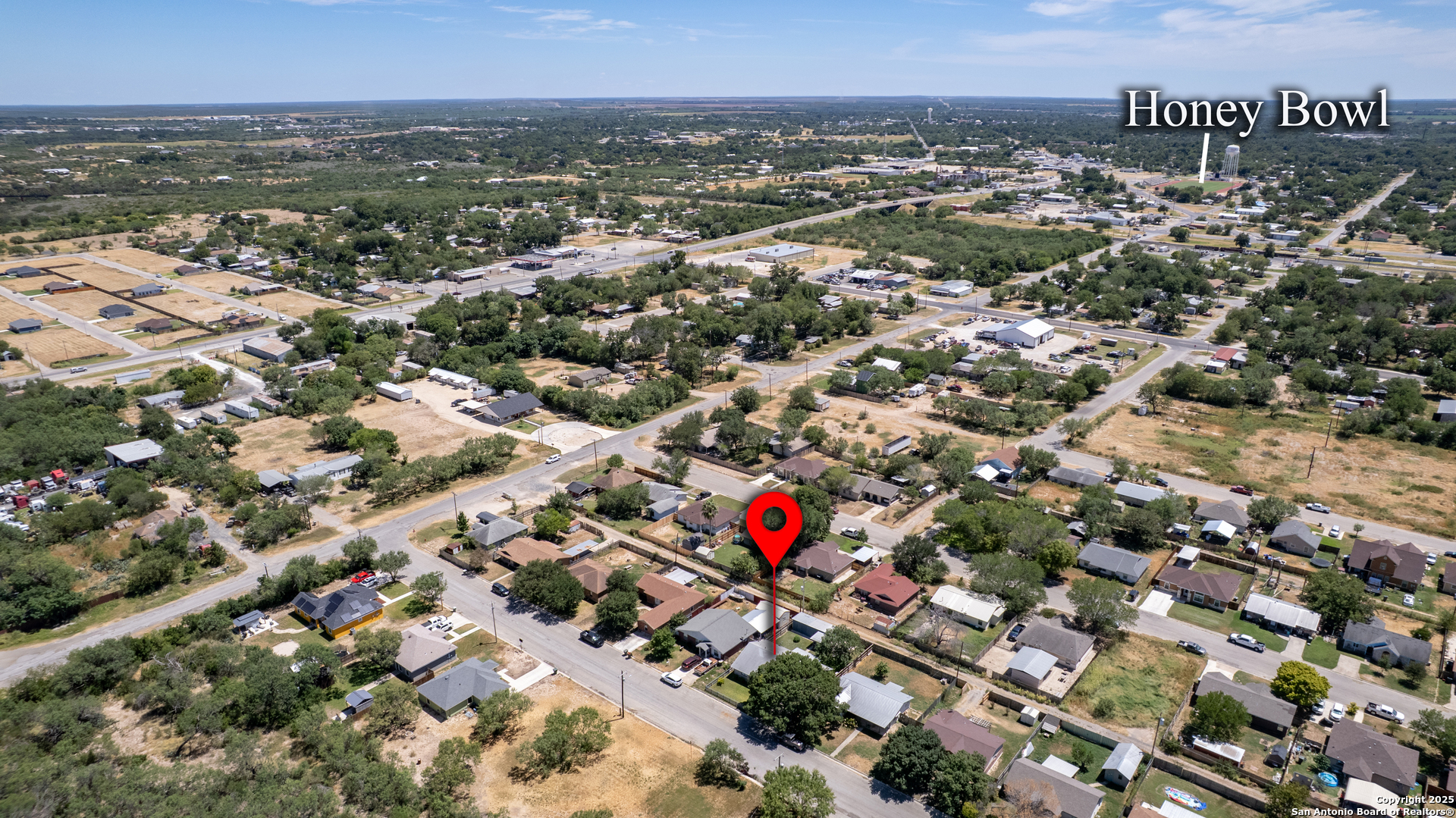 121 Rio Grande Street Uvalde, TX 78801 - Photo 23 of 29 an aerial view of residential houses with city view