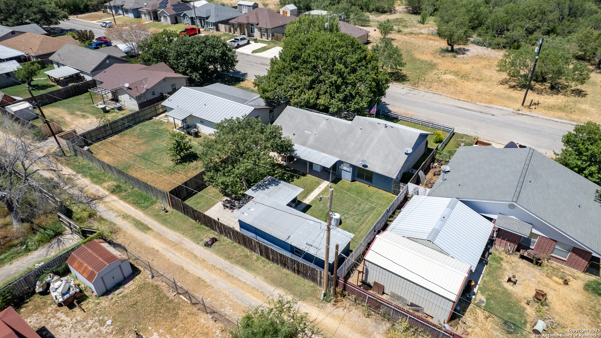 121 Rio Grande Street Uvalde, TX 78801 - Photo 29 of 29 an aerial view of a house with a garden