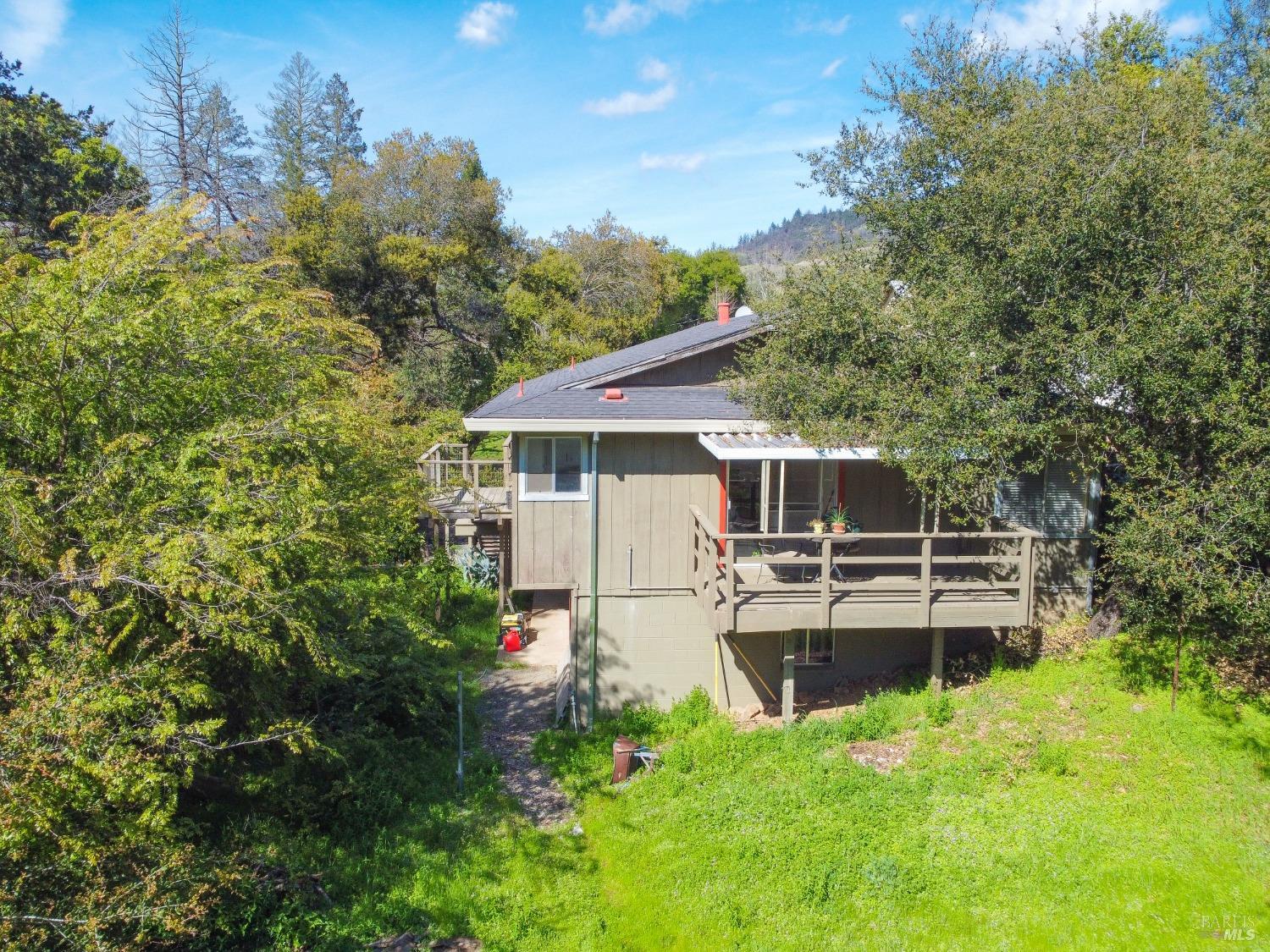 896 Sanitarium Road Deer Park, CA 94574 - Photo 4 of 20 a view of a house with backyard and sitting area