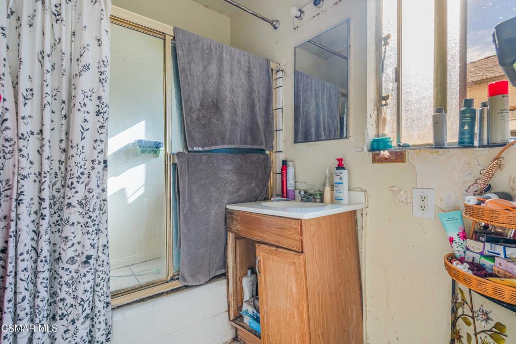 344 North 1st Street Montebello, CA 90640 - Photo 10 of 16 a utility room with cabinets washer and dryer
