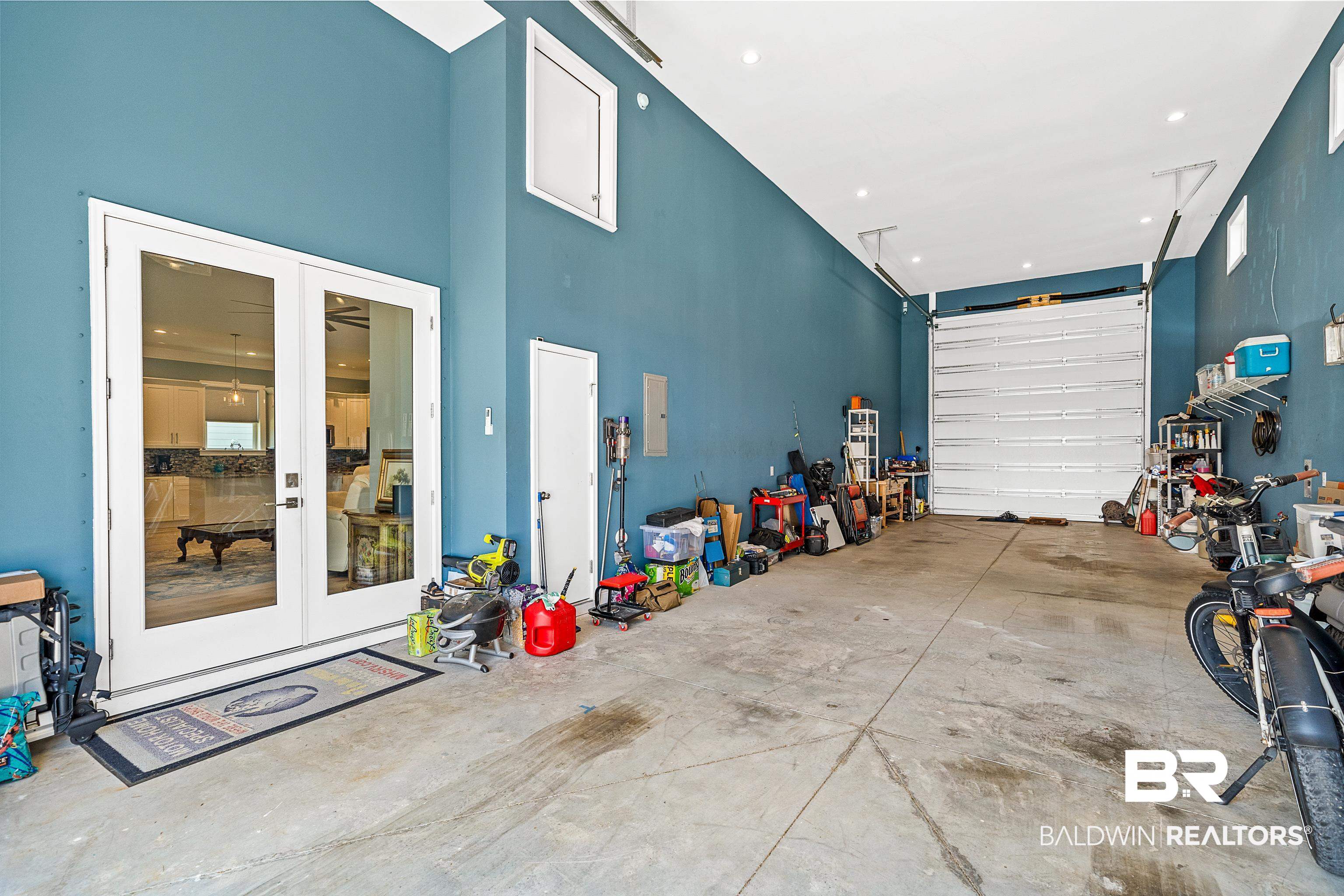12329 Reunion Place, Unit LOT 38 Foley, AL 36535 - Photo 22 of 43 Garage with french doors and recessed lighting