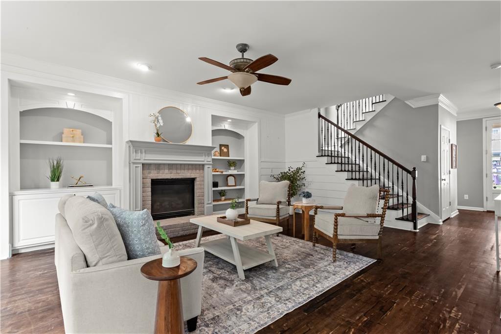 108 Laurel Street Canton, GA 30114 - Photo 11 of 33 a living room with furniture and a fireplace