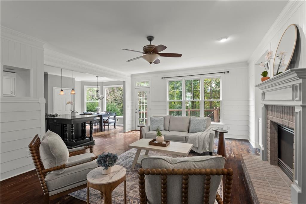 108 Laurel Street Canton, GA 30114 - Photo 12 of 33 a living room with furniture fireplace and a large window