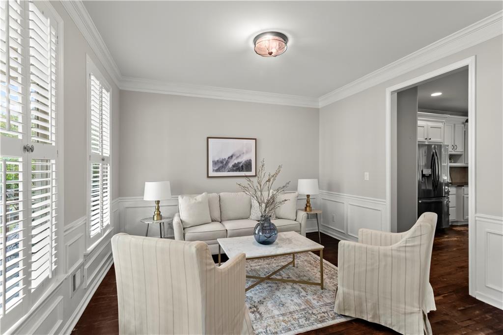 108 Laurel Street Canton, GA 30114 - Photo 5 of 33 a living room with furniture and a large window