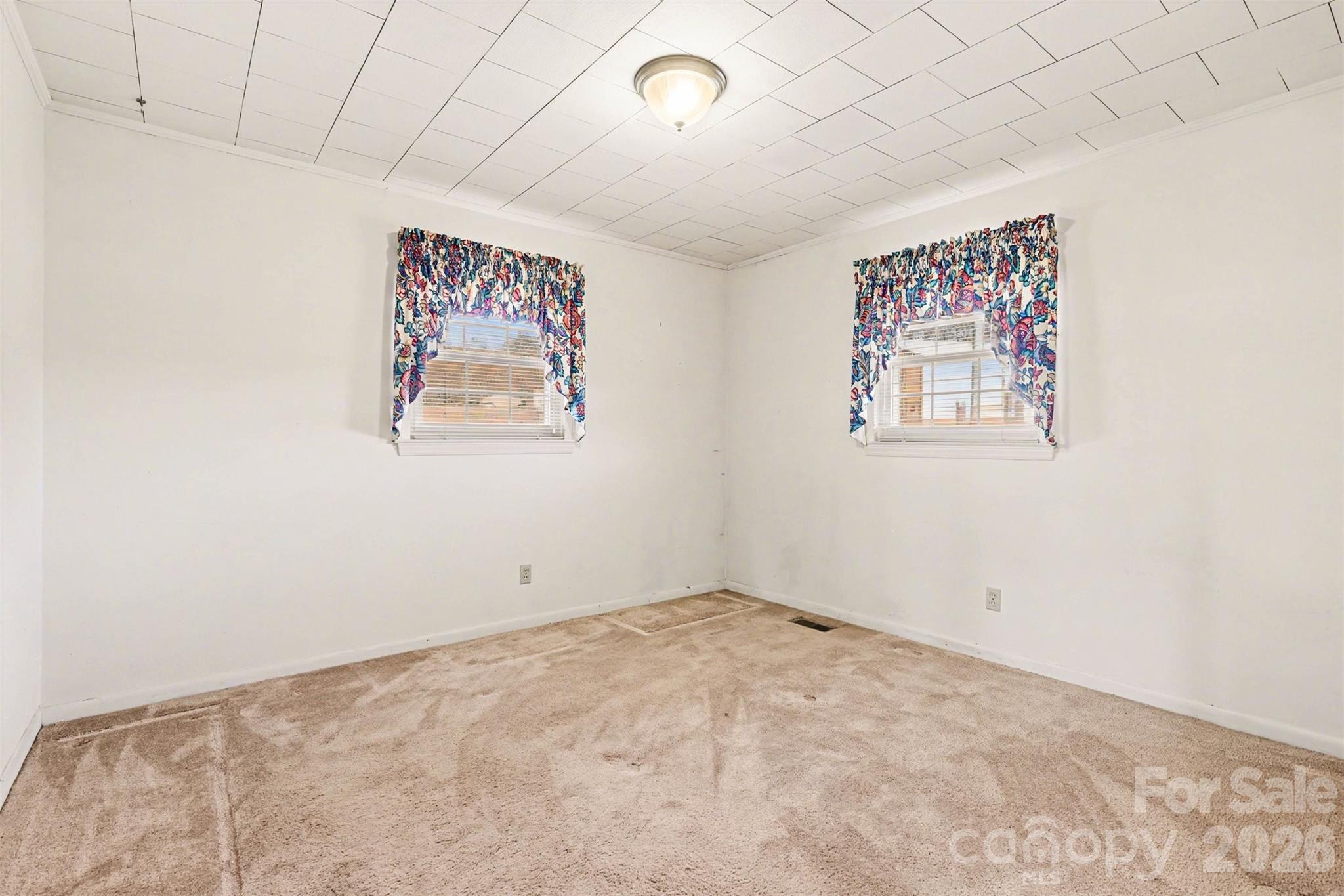 6501 Casar Road Casar, NC 28020 - Photo 12 of 45 an empty room with a painting on the wall