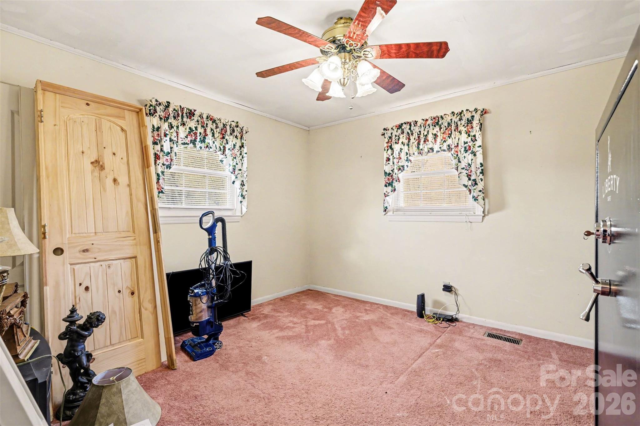 6501 Casar Road Casar, NC 28020 - Photo 14 of 45 a bedroom with a bed and a chandelier