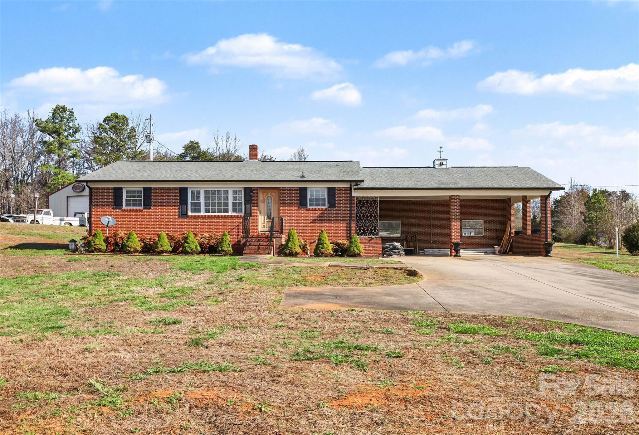 6501 Casar Road Casar, NC 28020 - Photo 2 of 45 front view of a house with a yard