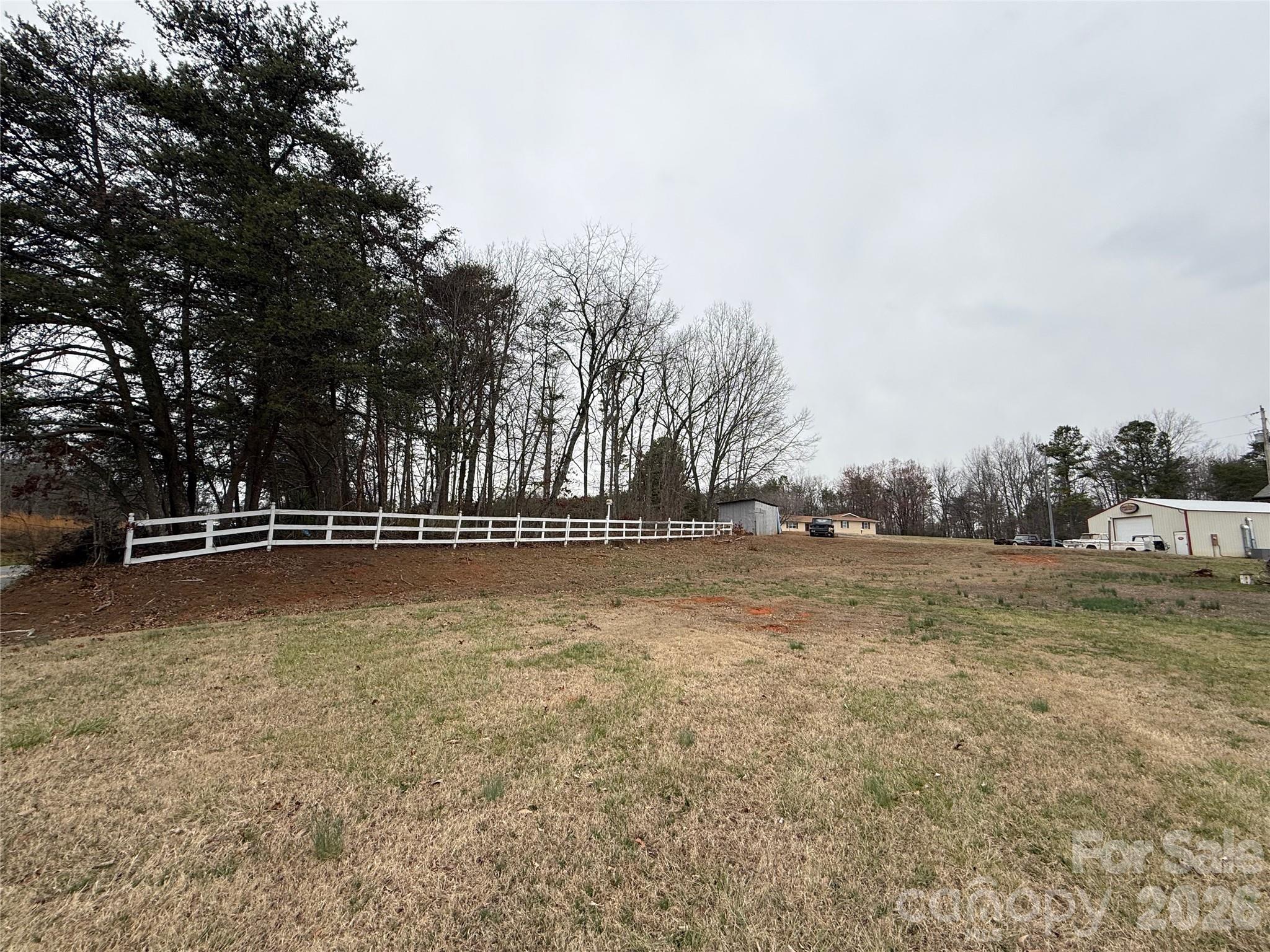 6501 Casar Road Casar, NC 28020 - Photo 26 of 45 a view of a swimming pool with a yard