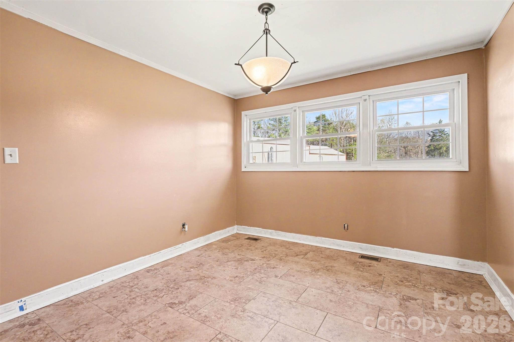 6501 Casar Road Casar, NC 28020 - Photo 9 of 45 a view of a big room with windows and chandelier fan