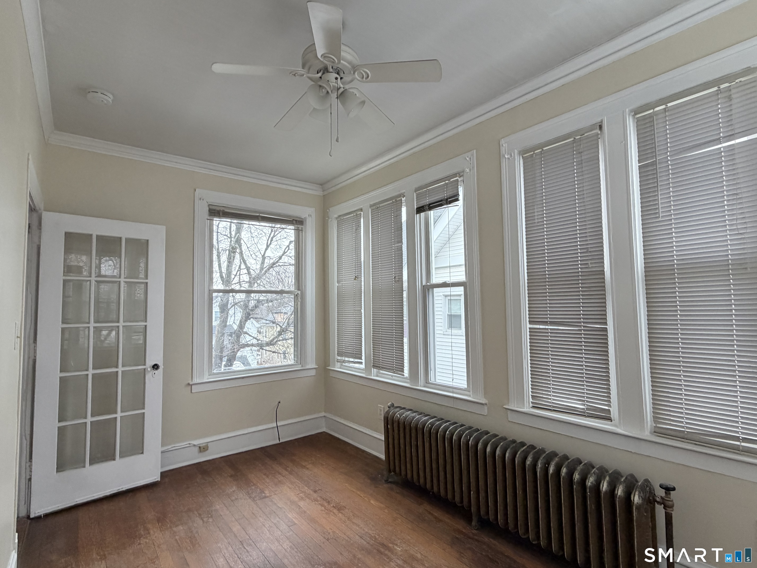 41-43 Hebron Street Hartford, CT 06112 - Photo 8 of 13 a view of an empty room with a window
