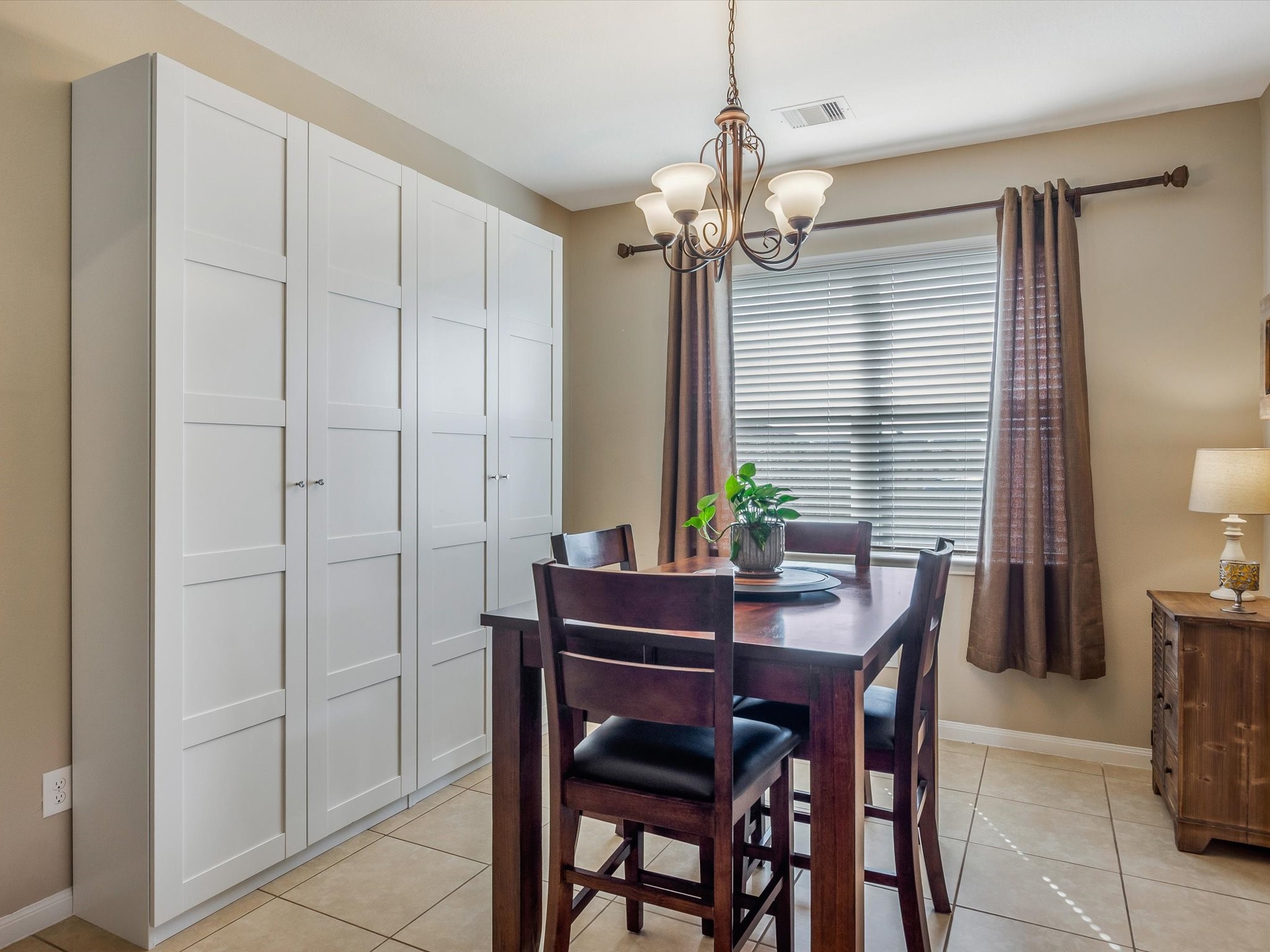 18746 Encinal Trail Magnolia, TX 77355 - Photo 11 of 35 a view of a dining room with furniture and window