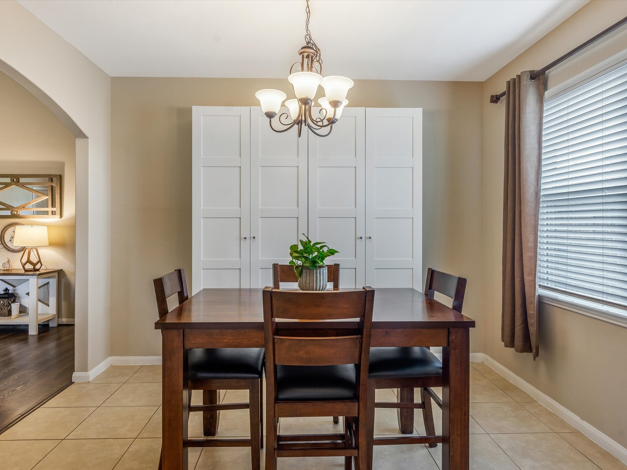 18746 Encinal Trail Magnolia, TX 77355 - Photo 12 of 35 a dining room with furniture and chandelier