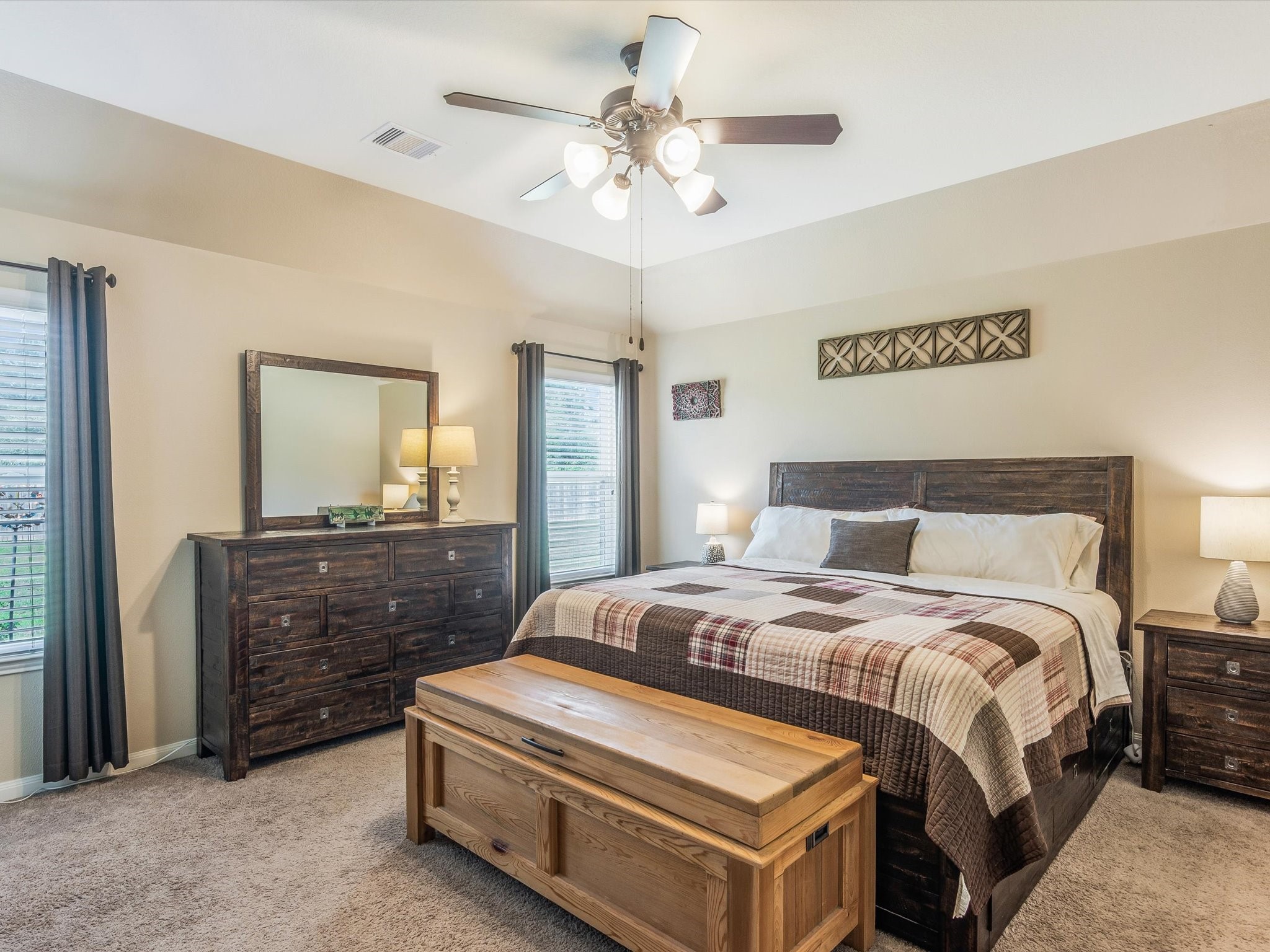 18746 Encinal Trail Magnolia, TX 77355 - Photo 17 of 35 a bedroom with a bed and a dresser