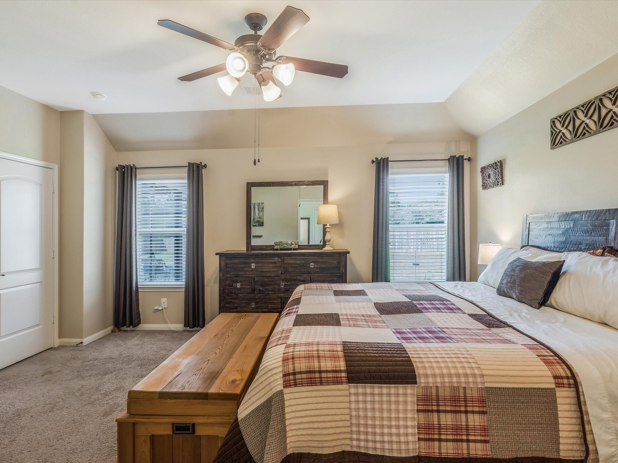 18746 Encinal Trail Magnolia, TX 77355 - Photo 19 of 35 a bedroom with a bed and a dresser