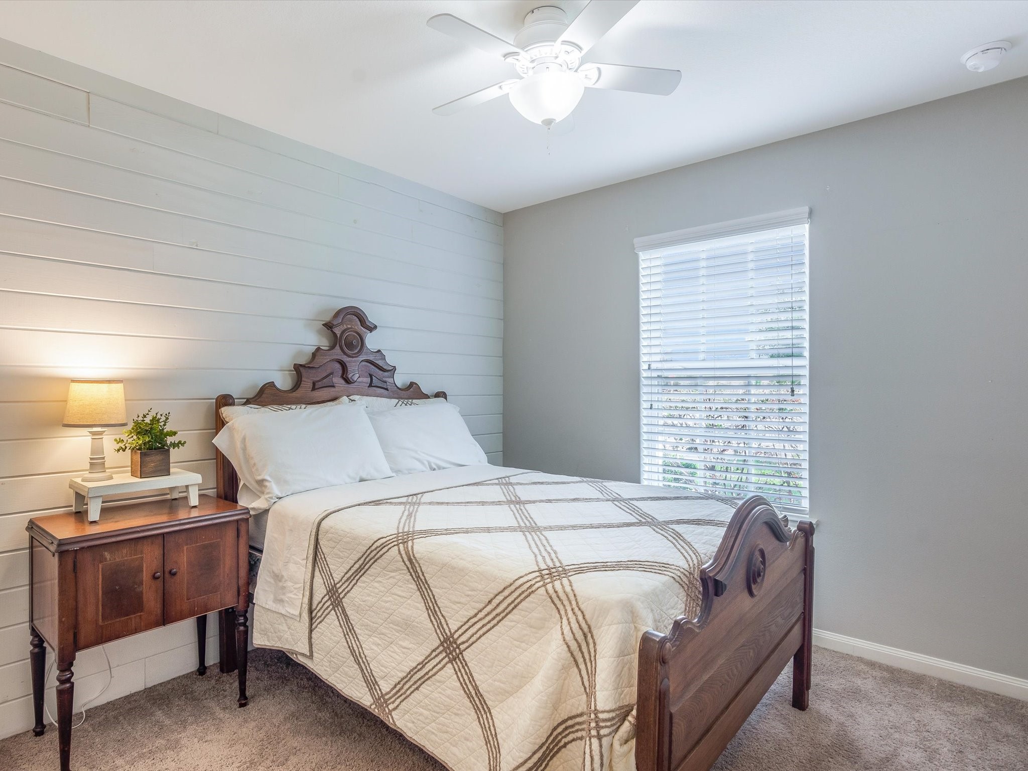 18746 Encinal Trail Magnolia, TX 77355 - Photo 23 of 35 a bed sitting in a bedroom next to a window