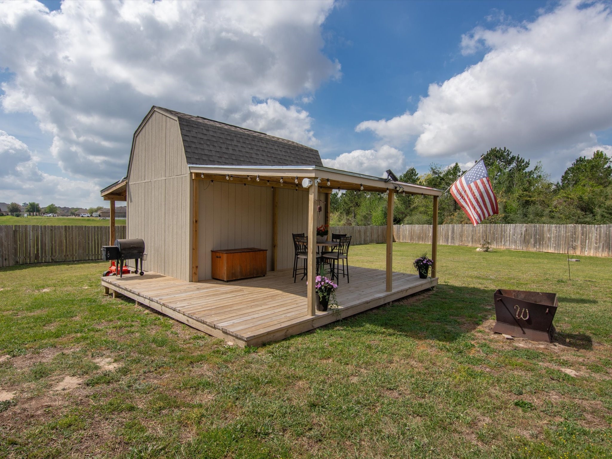 18746 Encinal Trail Magnolia, TX 77355 - Photo 29 of 35 a view of backyard with trampoline
