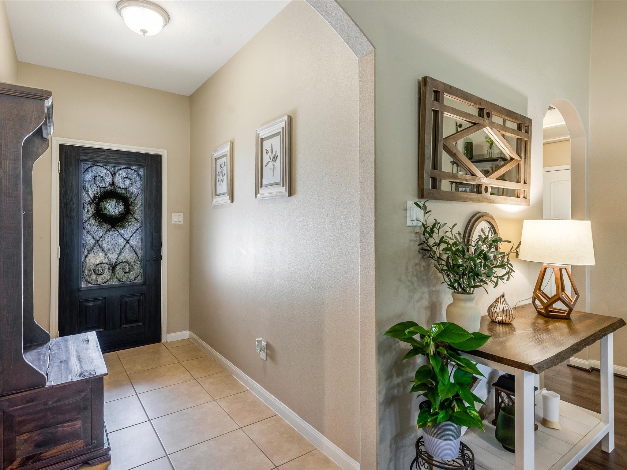 18746 Encinal Trail Magnolia, TX 77355 - Photo 5 of 35 a view of a hallway to bed and a potted plant