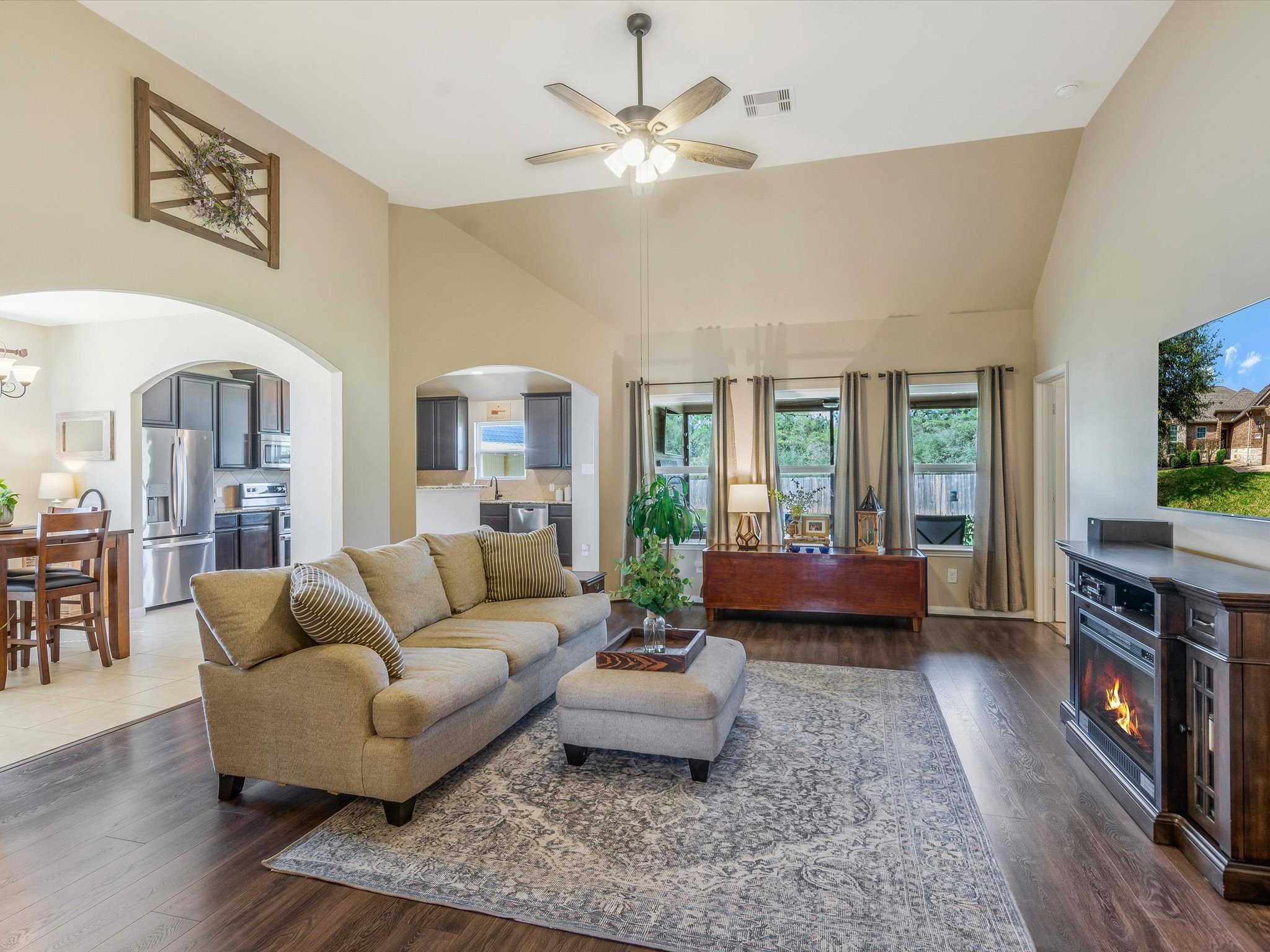 18746 Encinal Trail Magnolia, TX 77355 - Photo 6 of 35 a living room with furniture and a fireplace