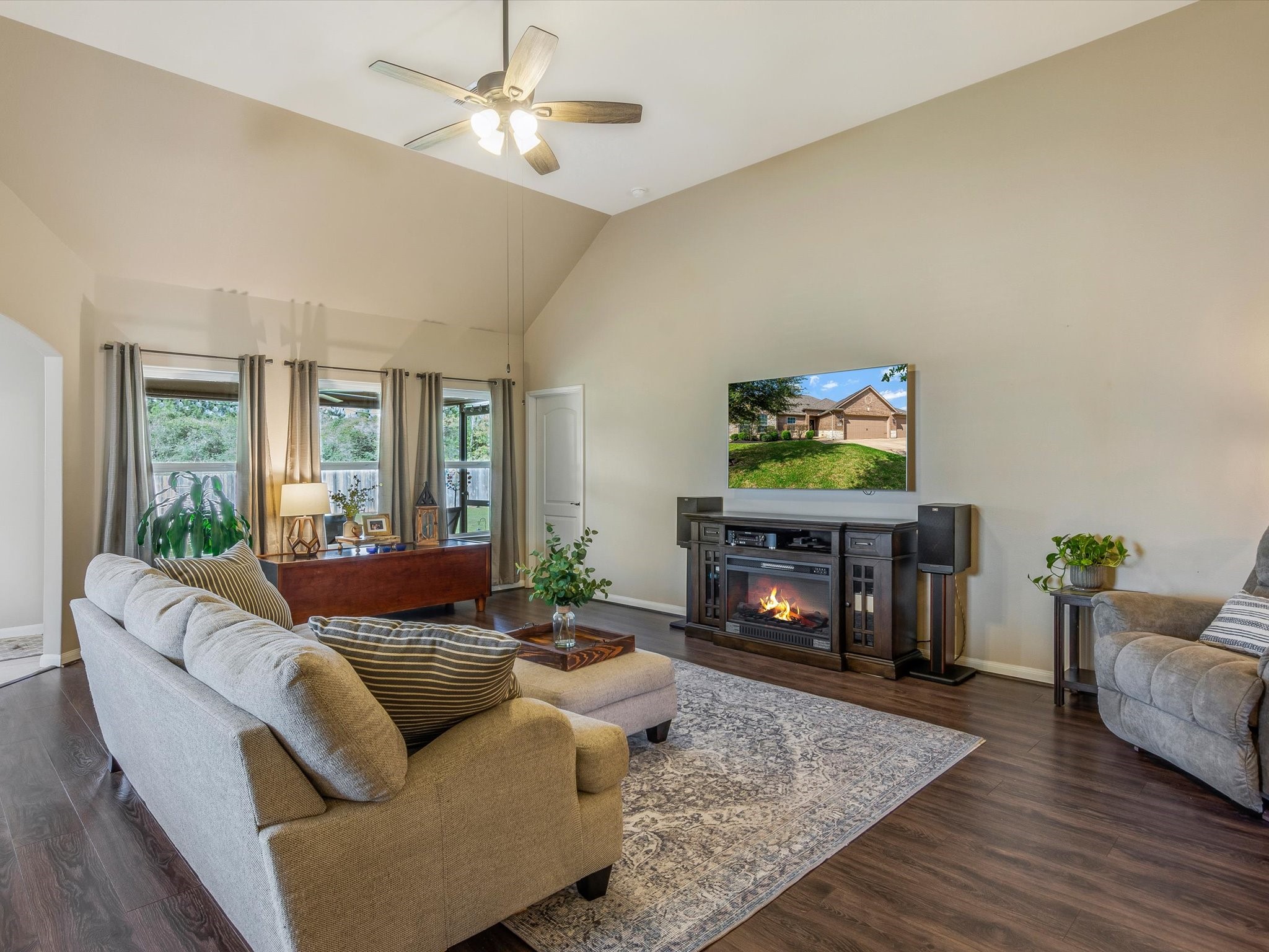18746 Encinal Trail Magnolia, TX 77355 - Photo 7 of 35 a living room with furniture and a fireplace
