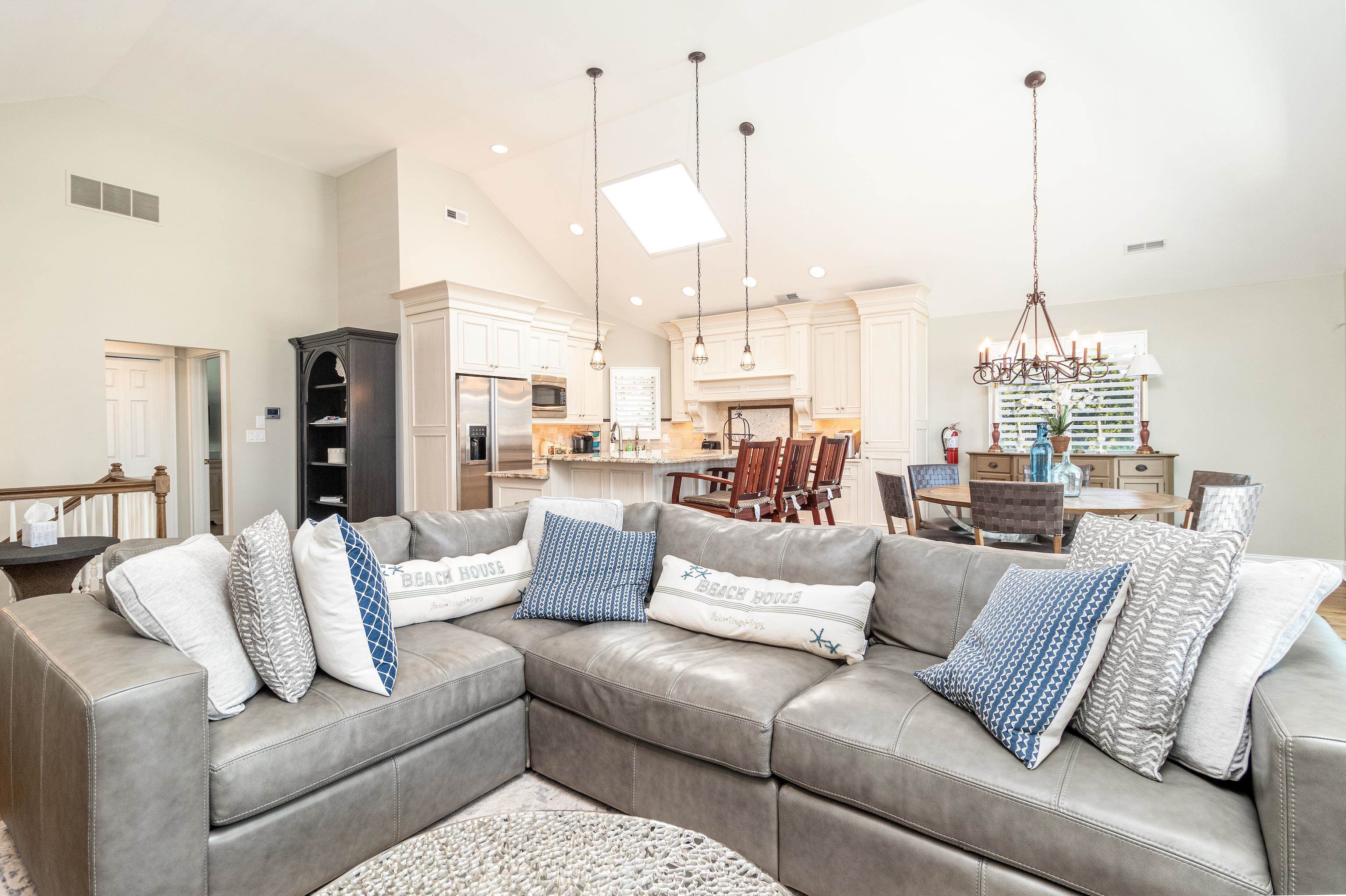 178 37th Street Avalon, NJ 08202 - Photo 16 of 26 a living room with furniture ceiling fan and a view of kitchen