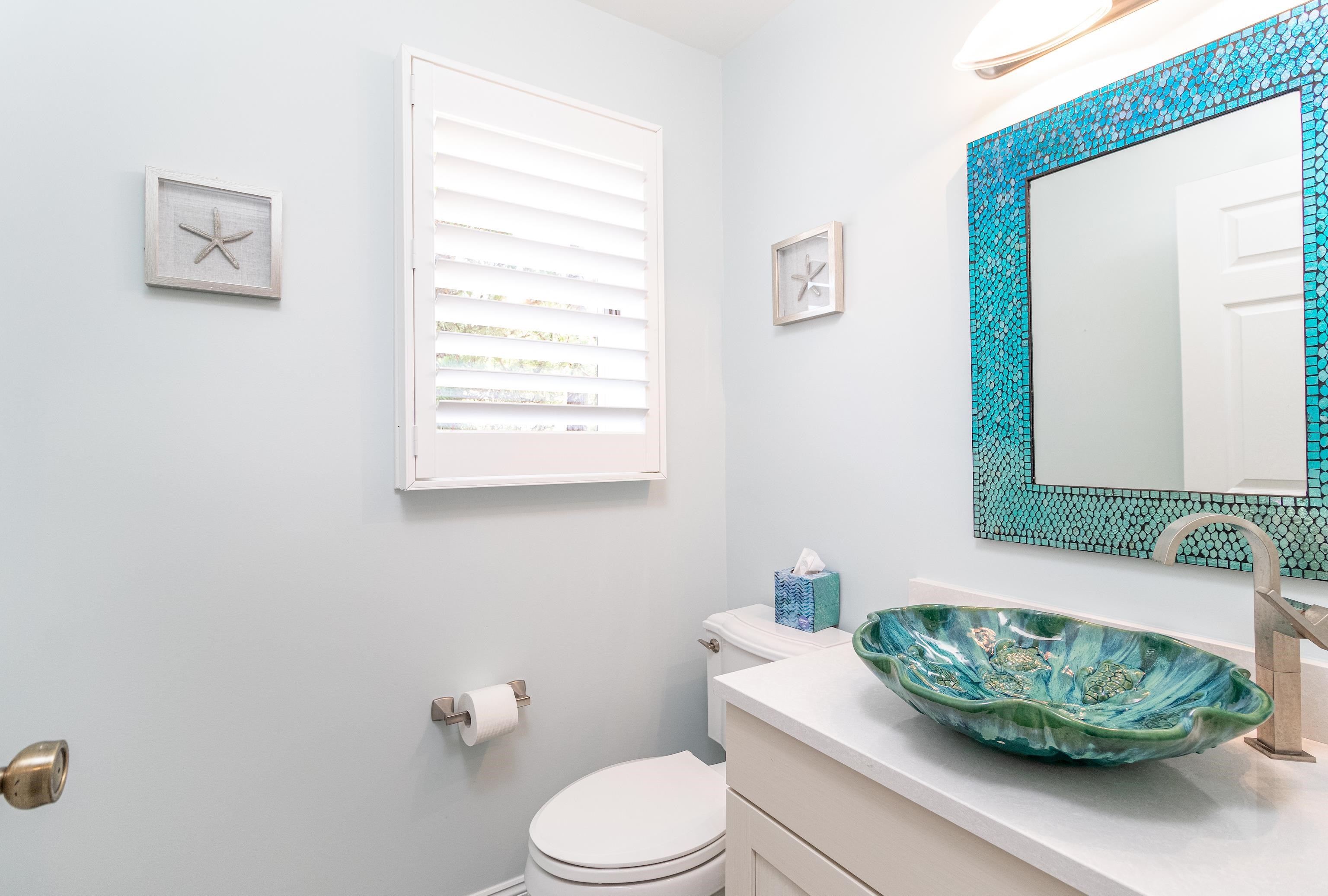 178 37th Street Avalon, NJ 08202 - Photo 17 of 26 a bathroom with a toilet a sink and a window