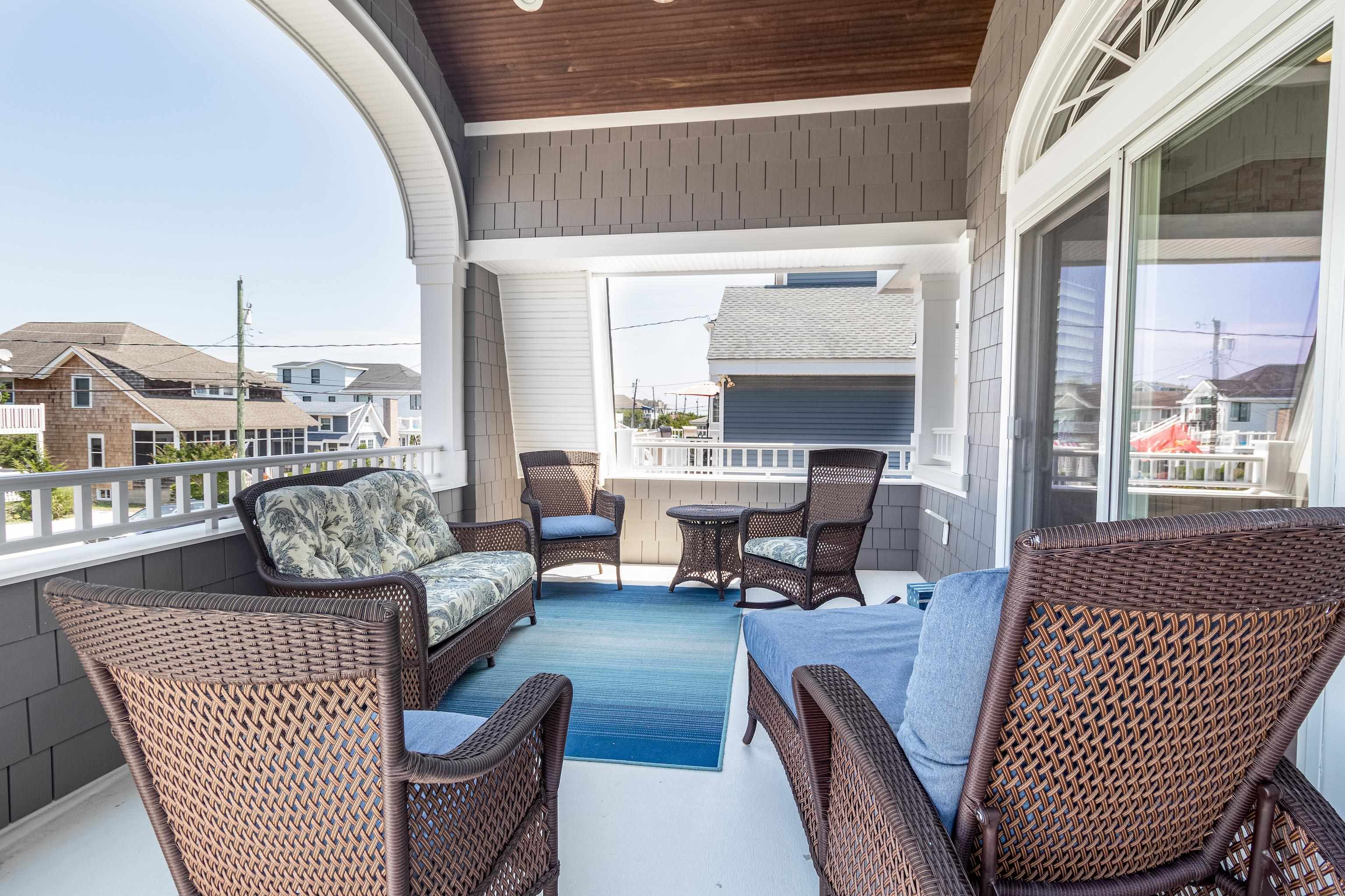 178 37th Street Avalon, NJ 08202 - Photo 18 of 26 a living room with furniture a fireplace and a table