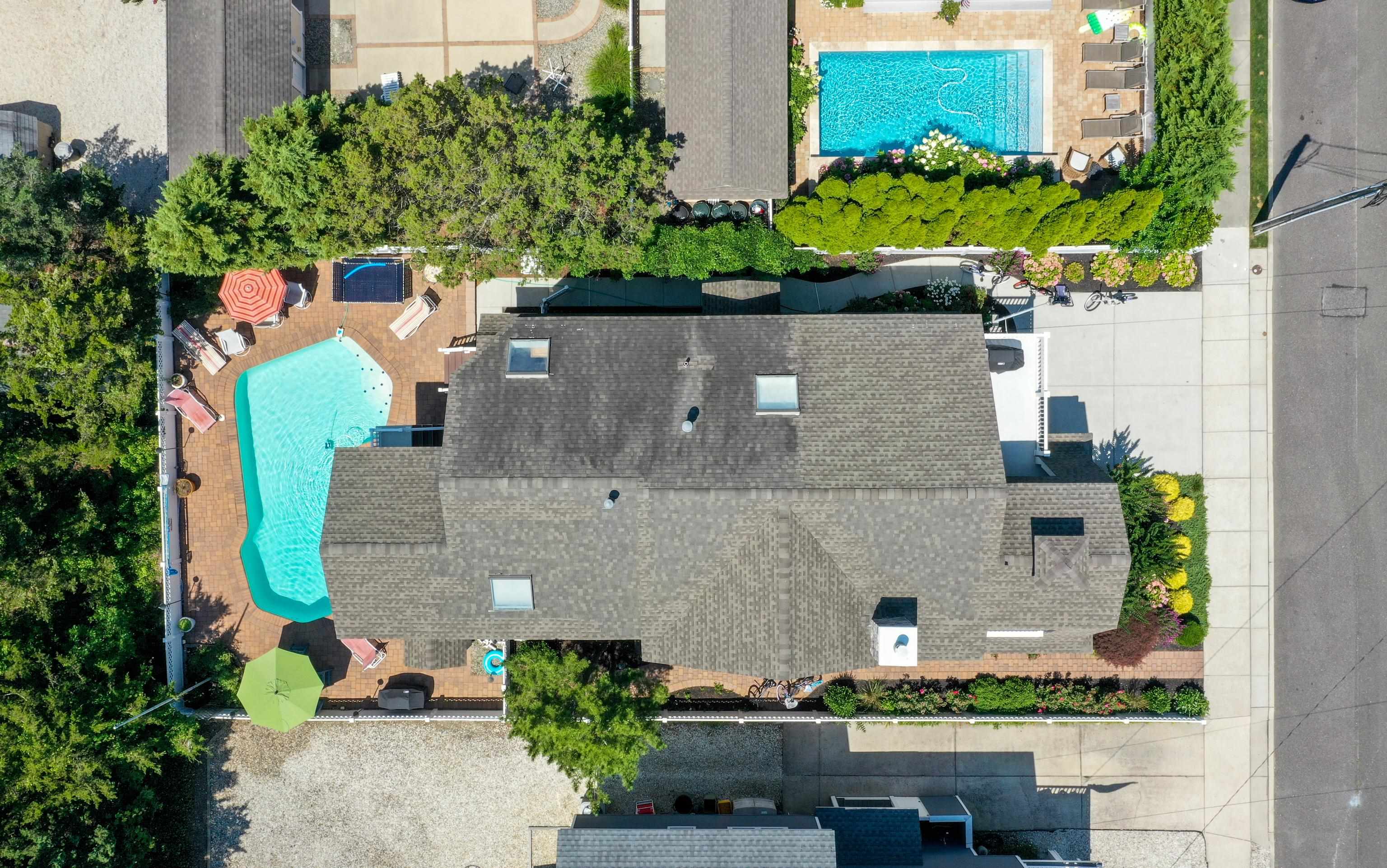 178 37th Street Avalon, NJ 08202 - Photo 3 of 26 an aerial view of a house with a yard