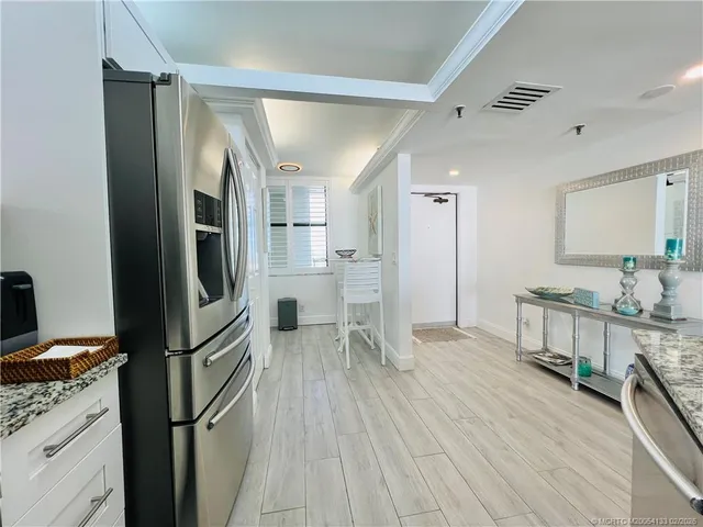 a room with a window and a table