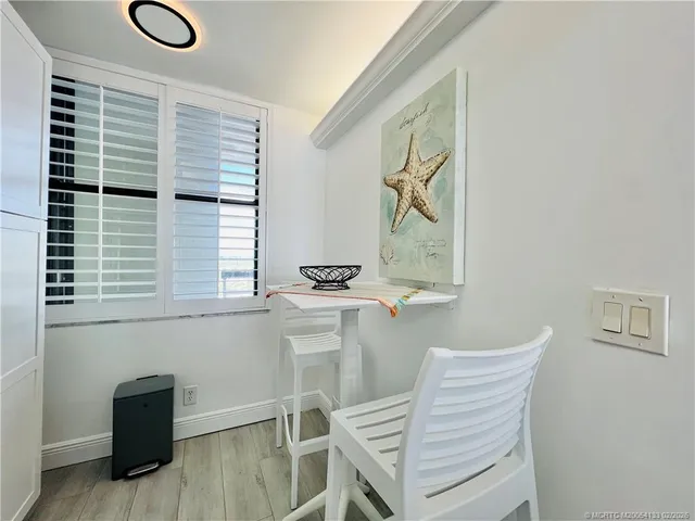 a kitchen with stainless steel appliances granite countertop a refrigerator sink and stove