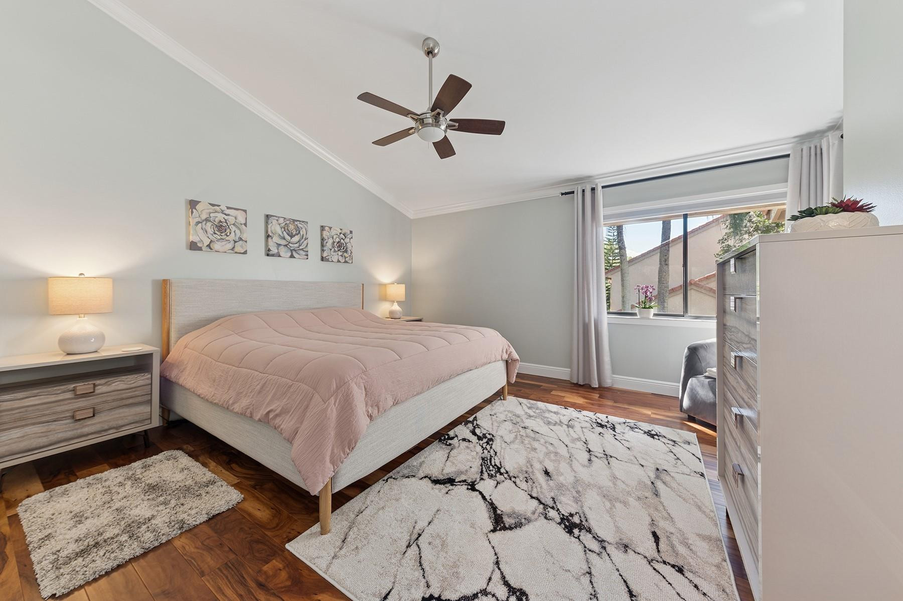 5560 Coach House Circle, Unit C Boca Raton, FL 33486 - Photo 11 of 19 a bedroom with a bed and window