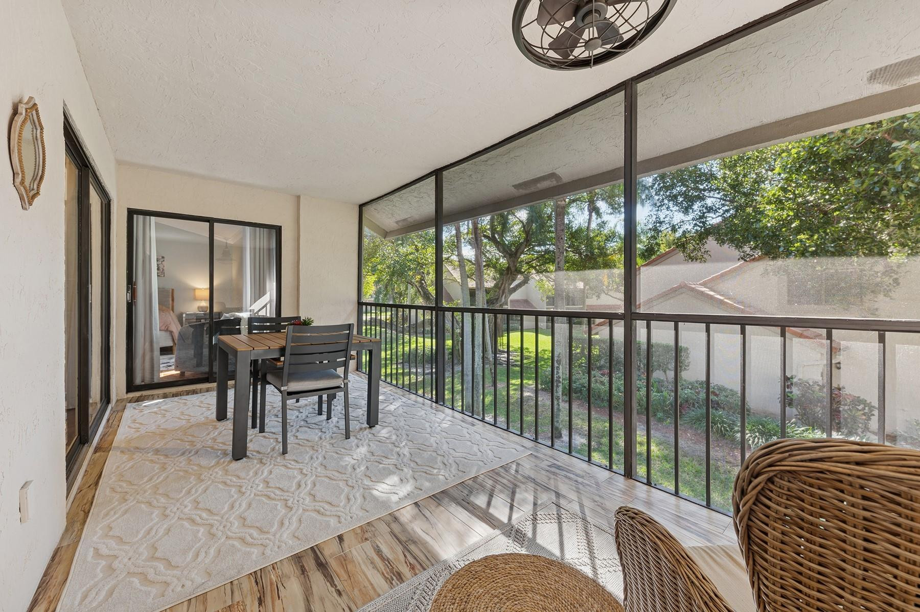 5560 Coach House Circle, Unit C Boca Raton, FL 33486 - Photo 18 of 19 a view of a livingroom with furniture