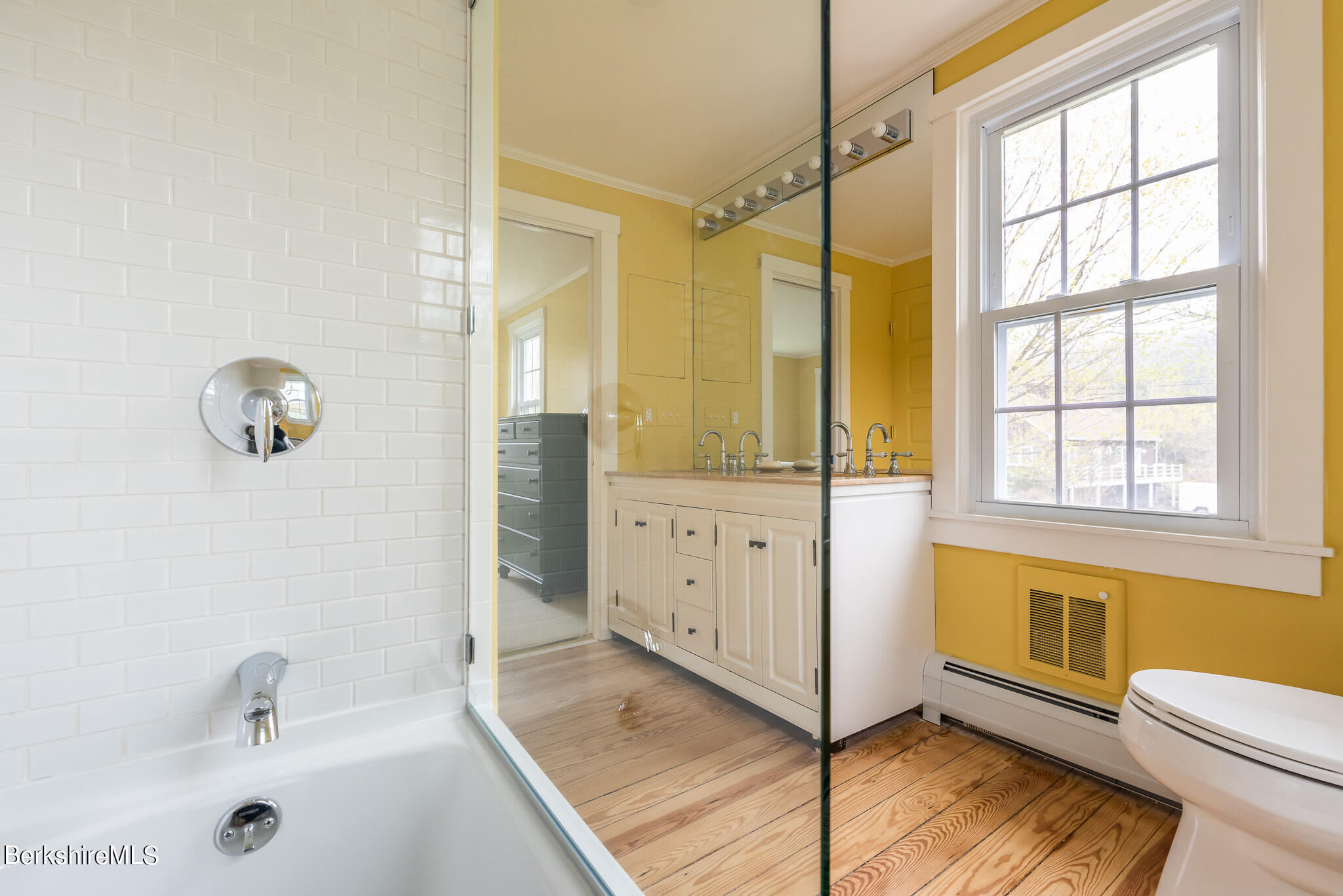 206 Blue Hill Road Great Barrington, MA 01230 - Photo 17 of 27 a bathroom with a tub sink and a mirror