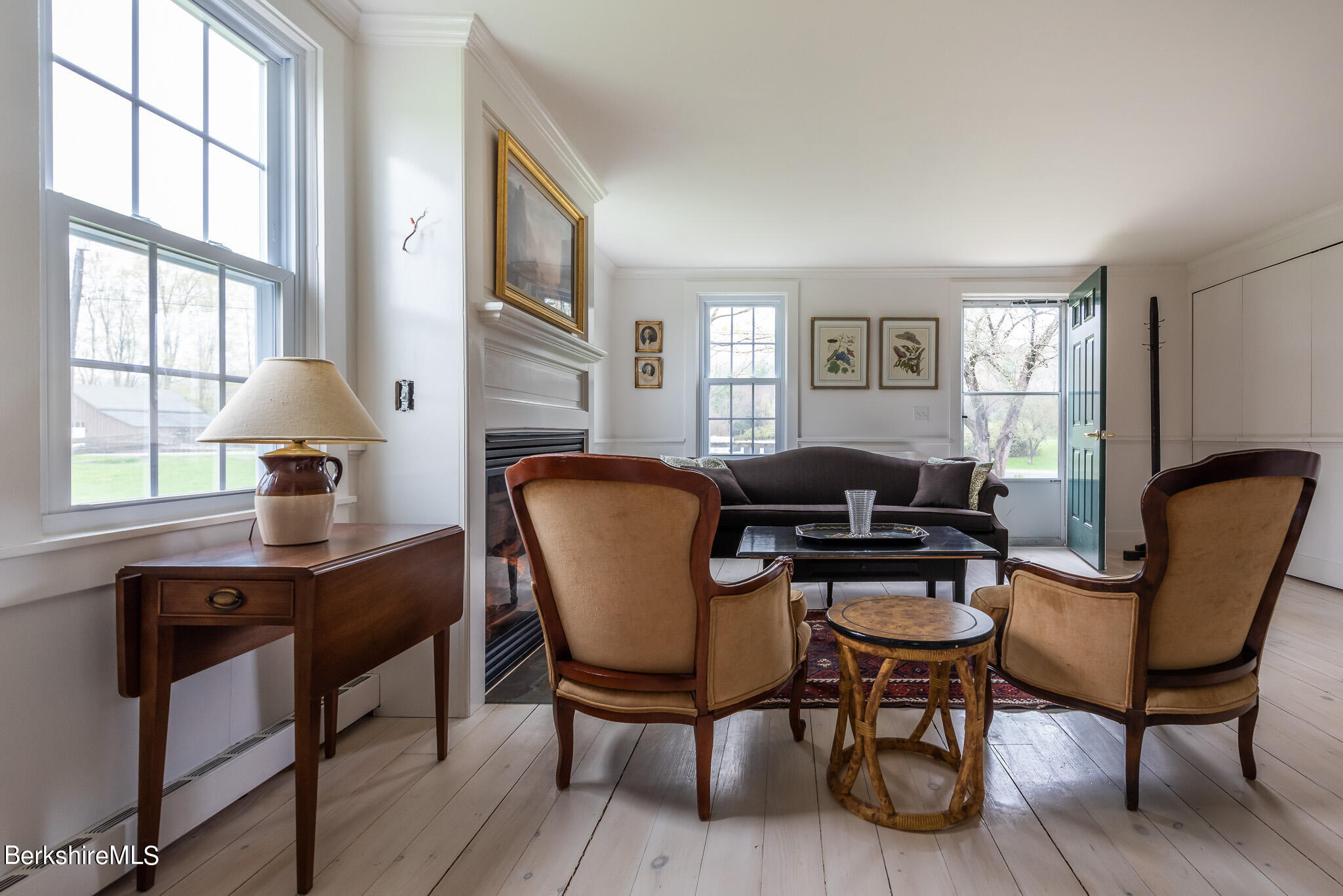206 Blue Hill Road Great Barrington, MA 01230 - Photo 4 of 27 a view of a workspace with furniture and a window