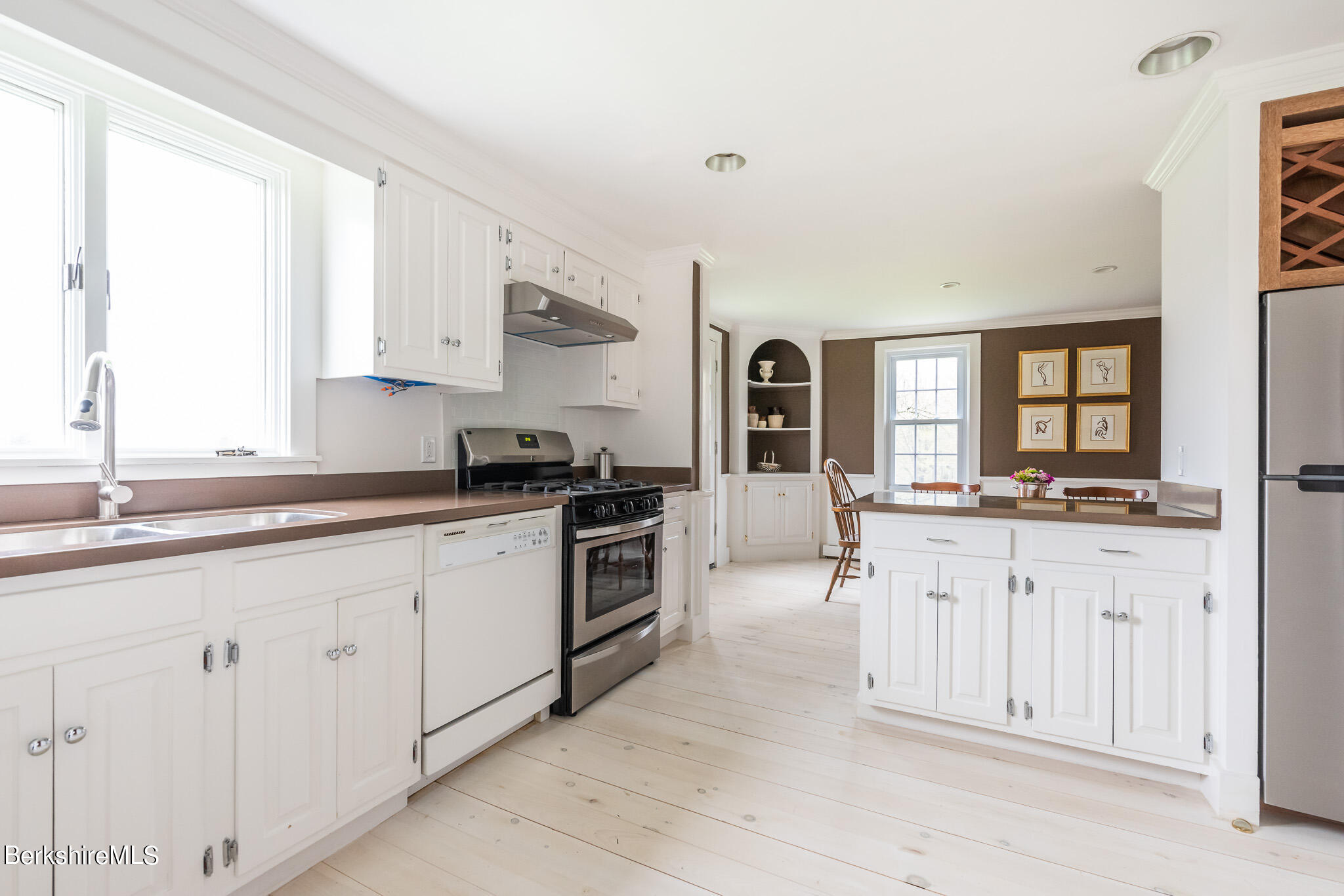 206 Blue Hill Road Great Barrington, MA 01230 - Photo 8 of 27 a kitchen with granite countertop white cabinets and white appliances