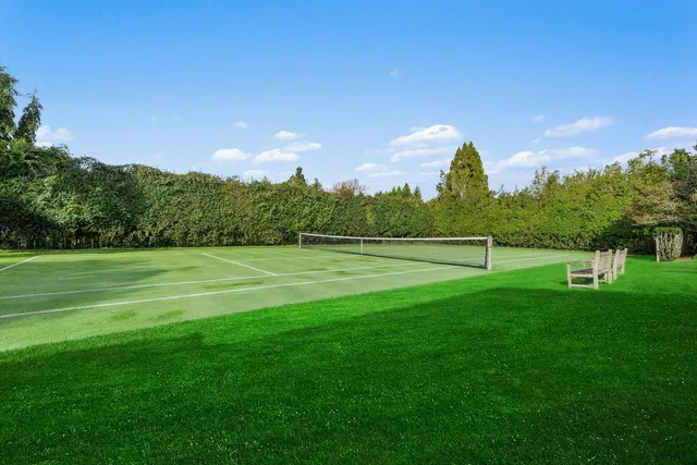 a view of a golf course with a lake