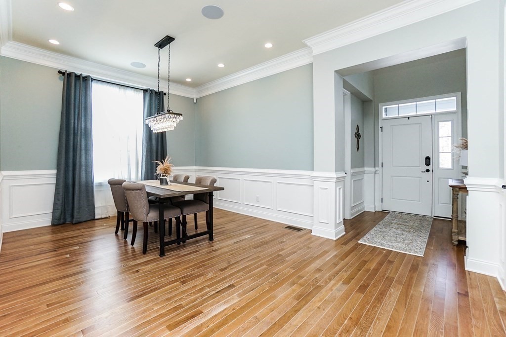 27 Pine Tree Drive, Unit 27 Methuen, MA 01844 - Photo 12 of 39 a view of a dining room with furniture window and wooden floor