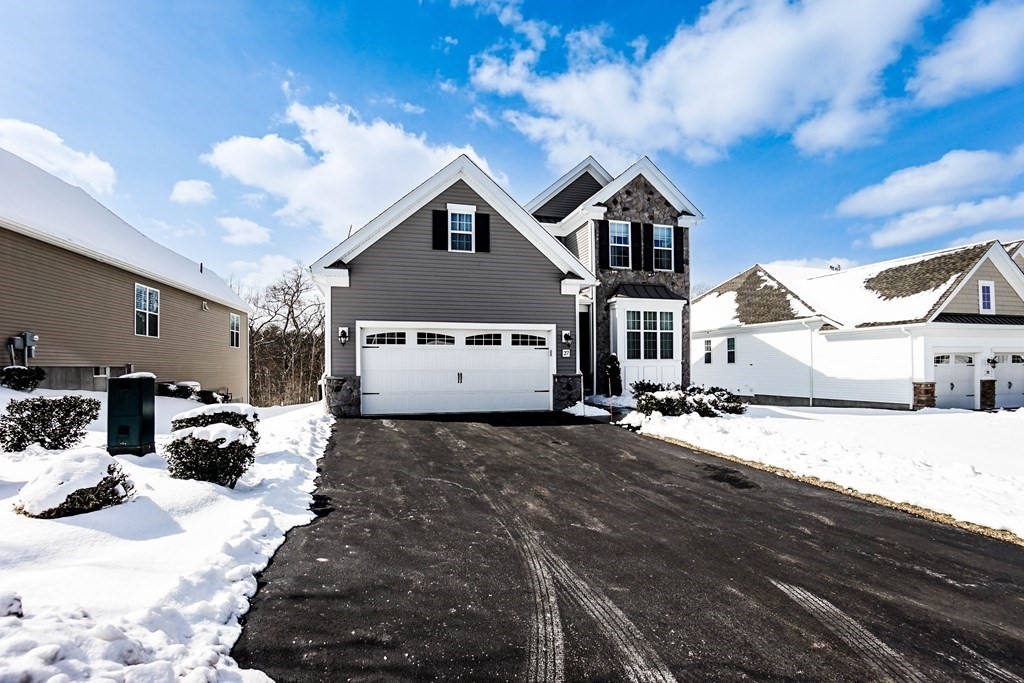 27 Pine Tree Drive, Unit 27 Methuen, MA 01844 - Photo 35 of 39 a view of a house with a yard