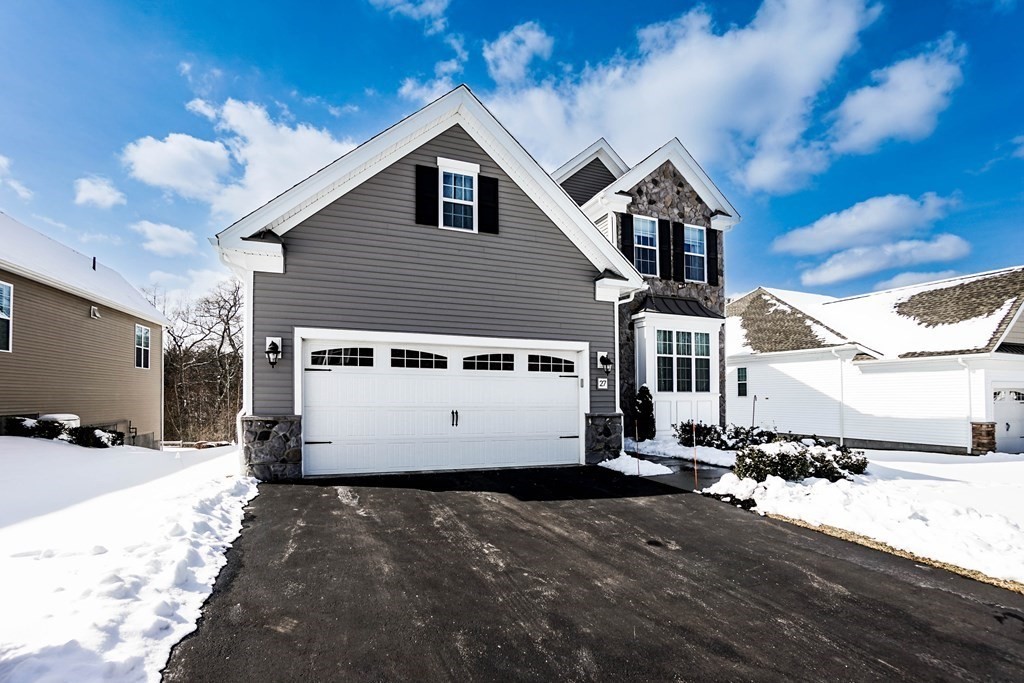 27 Pine Tree Drive, Unit 27 Methuen, MA 01844 - Photo 36 of 39 a view of a house with a yard