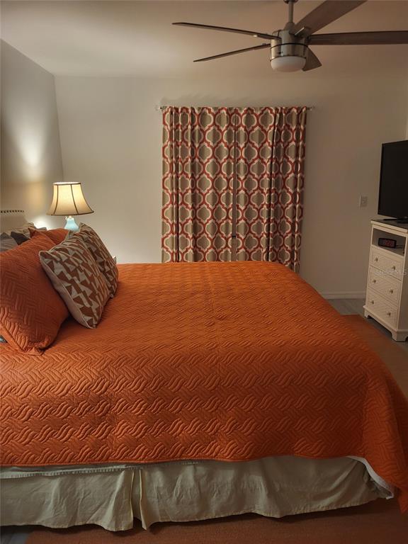 482 Pendleton Place Venice, FL 34292 - Photo 17 of 54 a bedroom with a bed and a tv