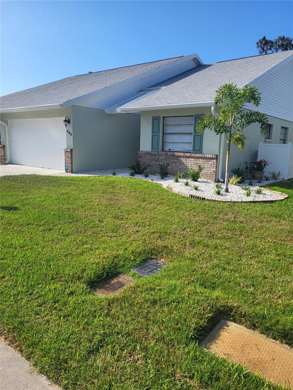 482 Pendleton Place Venice, FL 34292 - Photo 2 of 54 a view of a house with pool and garden